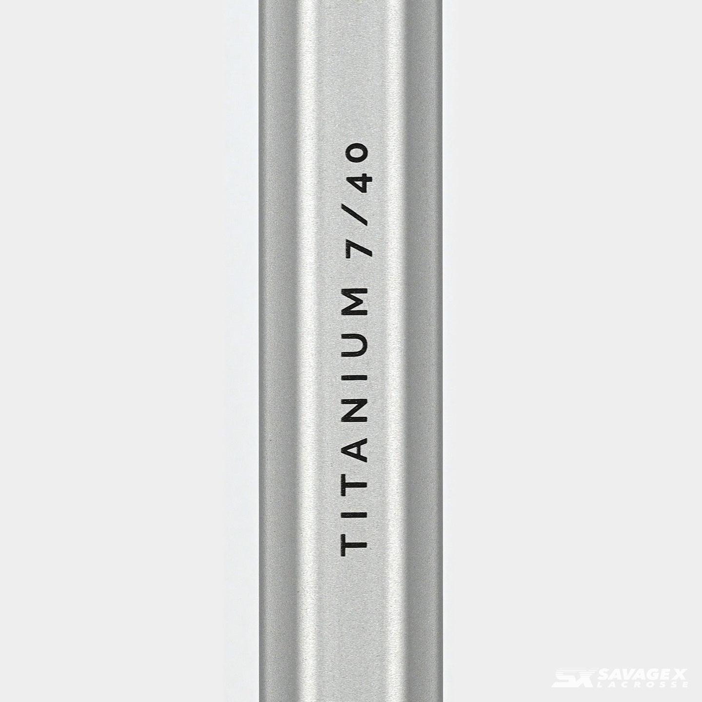 A product video of the Titanium 7/40 Lacrosse Shaft in Silver colorway, showing the graphics up close and at a 45 degree angle.