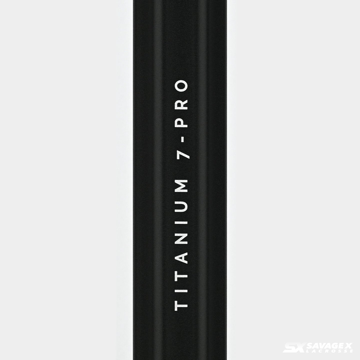 A product video of the Savage X Lacrosse Titanium 7-PRO shaft, in Black colorway, showing a closeup view of the logo graphic and a 45 degree view of the shaft.